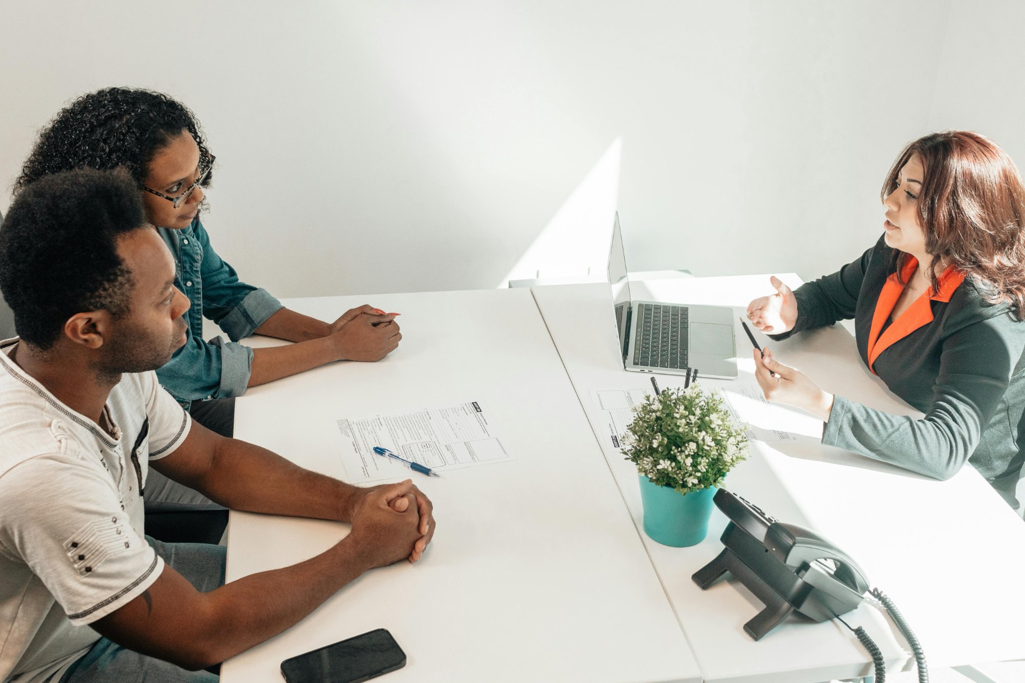 Business funding consultant meeting with Rochester clients